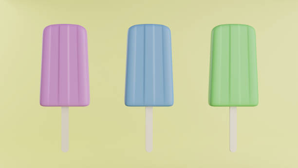 istock Pink, blue and green popsicle on yellow background 1217742256