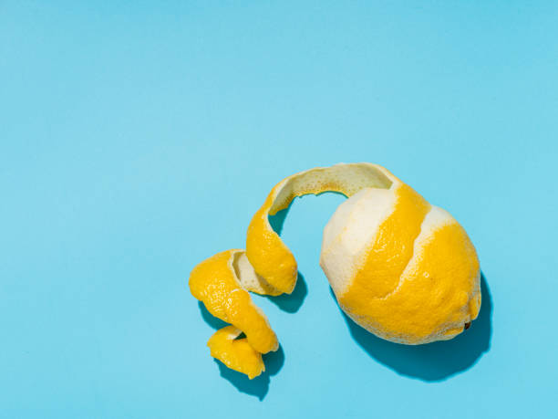 istock Lemon and spiral peel on blue background hardlight 1217742966