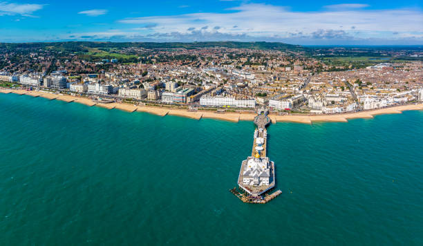 Aerial view of Eastbourne in summer, UK Aerial view of Eastbourne in summer, UK eastbourne pier photos stock pictures, royalty-free photos & images