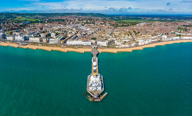 Aerial view of Eastbourne in summer, UK Aerial view of Eastbourne in summer, UK eastbourne pier photos stock pictures, royalty-free photos & images