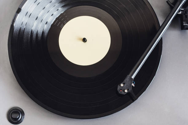istock Turntable playing vinyl LP record at home 1217760960
