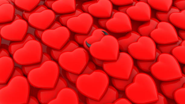 istock Background of red hearts and devil heart with horns 1217763346
