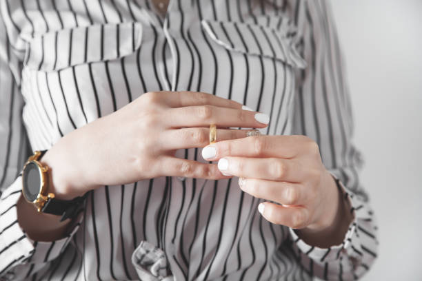 istock Girl putting ring on finger. 1217763770