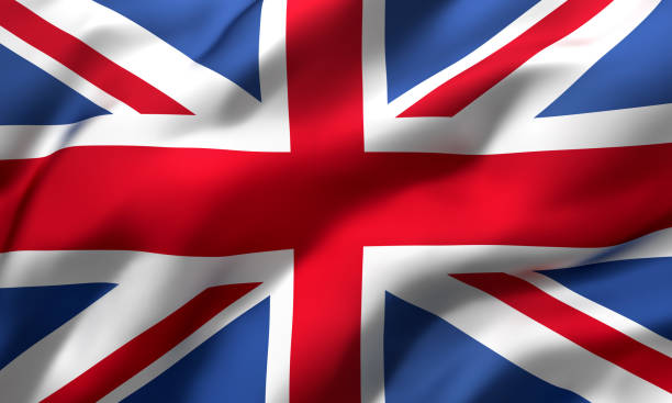flagge des vereinigten königreichs weht im wind - großbritannien stock-fotos und bilder