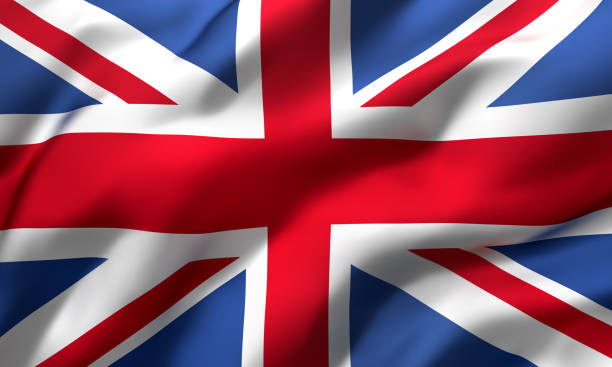 bandiera del regno unito che soffia nel vento - british flag foto e immagini stock