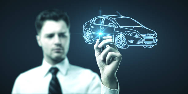 istock Businessman with pen  drawing  model car 1217770862
