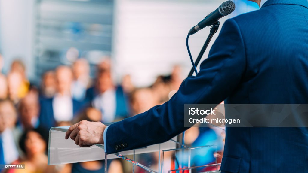 Election campaign Politician during election campaign, speaking to the crowd from stage Politician Stock Photo