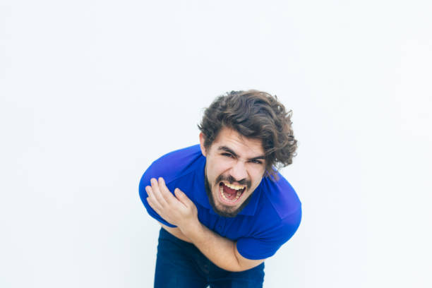 istock Frustrated unhappy guy screaming with pain 1217771698