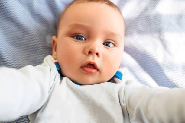 istock The baby makes selfie. 1217772891