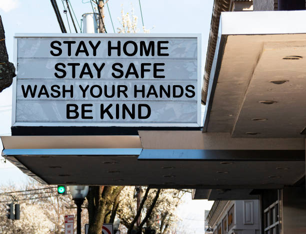 istock Billboard reads stay home stay safe wash your hands and be kind 1217773499