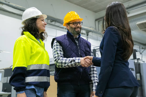 istock Positive engineers and company representative meeting onsite 1217775774