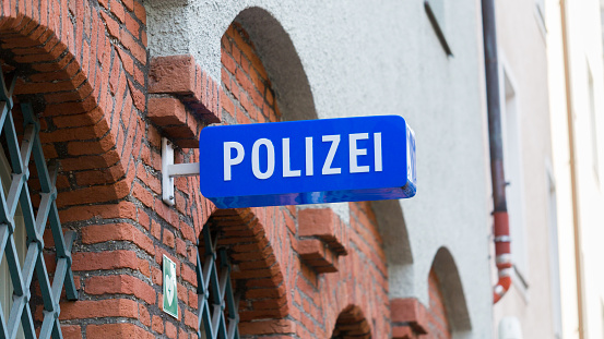 Polizei sign at the facade of a police station - Munich, Bavaria / Germany