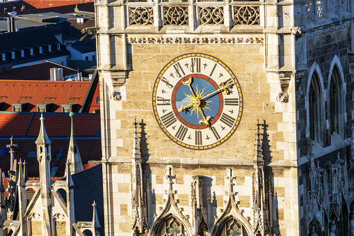 Clock of The New Town Hall (Neues Rathaus) on Marienplatz in Munich city, Bavaria, Germany