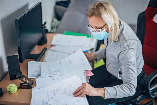 istock Woman working at home during coronavirus quarantine 1217784349