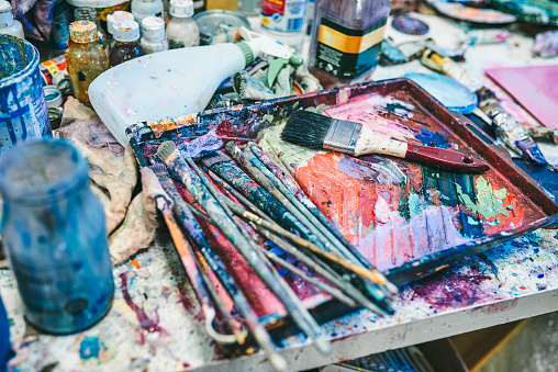 Shot of an artist's workspace in an empty studio at home