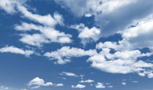 istock Bright blue sky with white varied clouds 1217792162