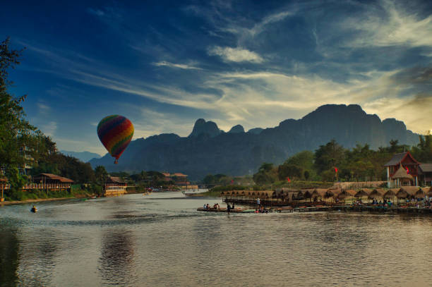 Hot air ballooning  over the nam song river vang vieng Laos stock photo