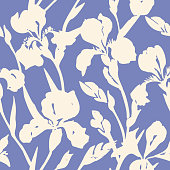 istock floral seamless pattern made of silhouettes of blooming iris flowers 1217794606