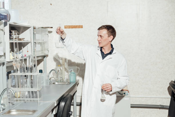 istock young scientist conducts chemical experiments with liquids in science laboratory 1217796103