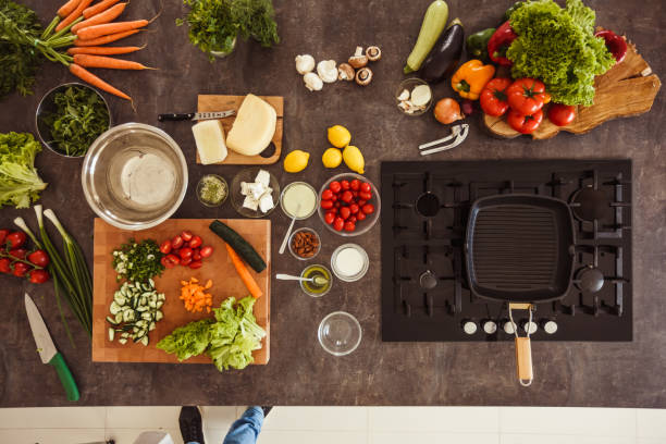istock Unrecognizable man preparing delicious salad 1217796387