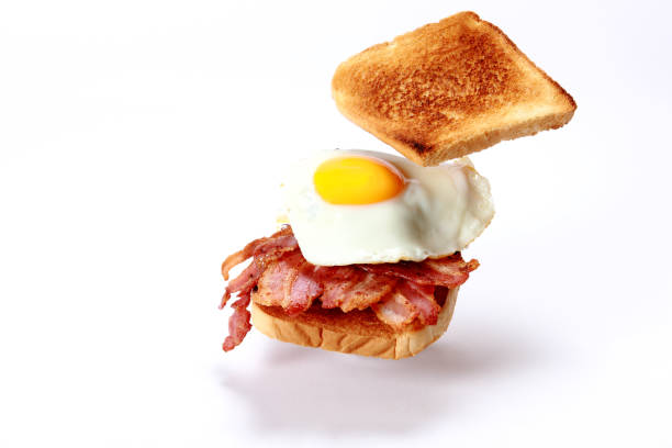 bacon buttie o toastie - breakfast eggs bacon fried egg fotografías e imágenes de stock