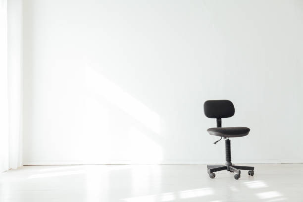 black office chair in an empty white office