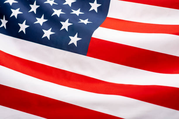 istock Image of the american flag flying in the wind 1217803866