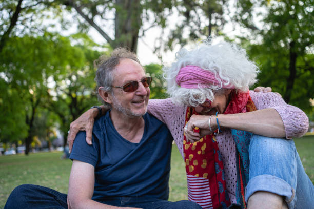 istock Senior couple in love having fun at a park 1217805473