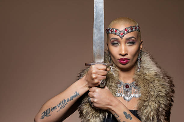 Silver viking inspired black warrior female in studio shot