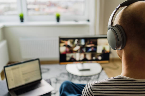 istock Man having video call with colleagues 1217809822