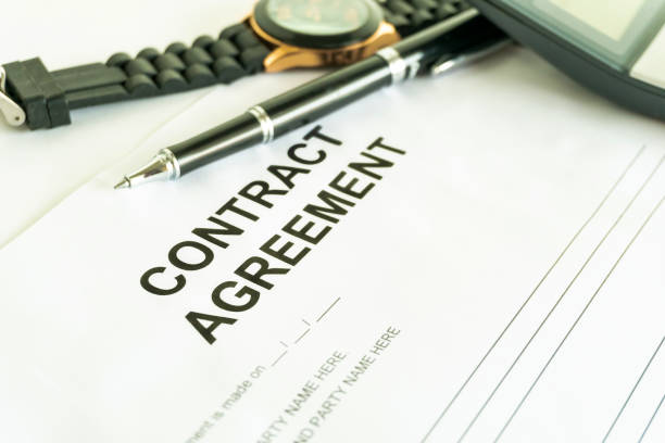 istock contracts agreement sign on document paper with black pen 1217810305