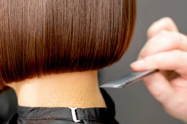 istock Combing hair of woman. 1217811385