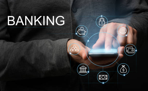 istock Investor using internet banking application to make money transfer via smartphone, collage with finance icons 1217813012