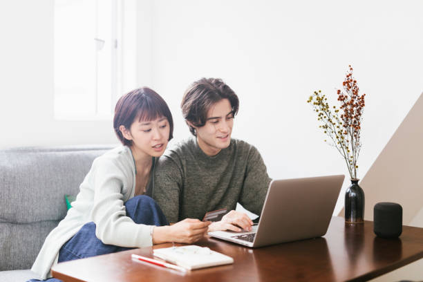istock Couple Shopping Online 1217813637