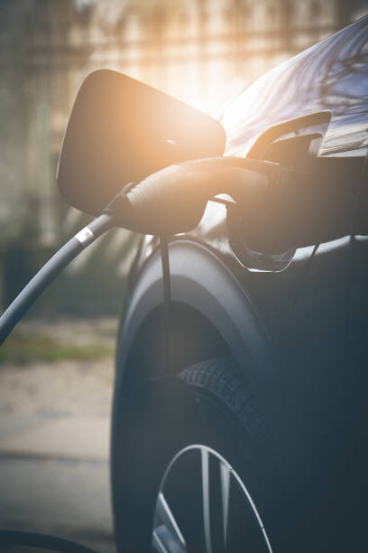 Recharging electric car stock photo