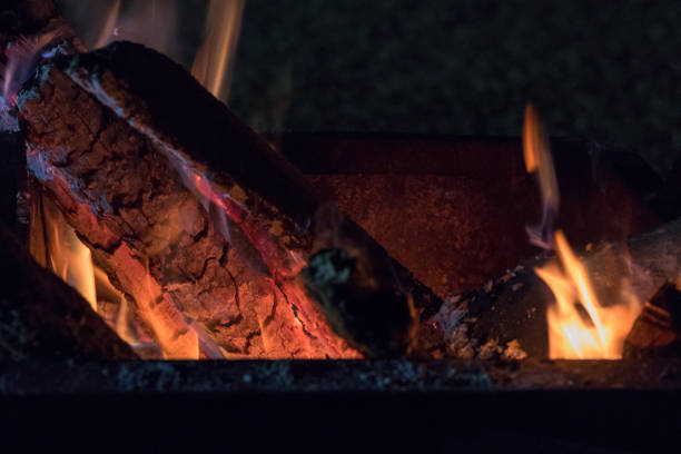 istock Burning wood with orange glow 1217813786