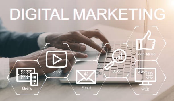 istock Digital marketing strategies collage with e commerce icons on imaginary screen and businessman working on laptop 1217813972