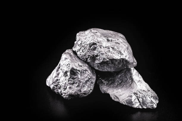 istock large silver stone, rare silver nugget on black background. Gemstone in high resolution, luxury concept. 1217816406