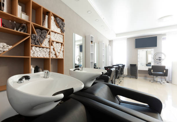 istock Black head-wash armchairs at modern beauty salon 1217816597