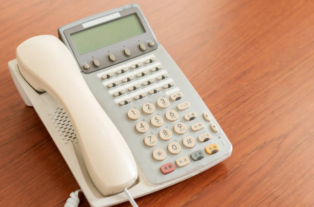 istock old office telephone on the desk for business 1217817839