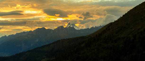 istock sunset in the mountains peak in switzerland summer 1217818297