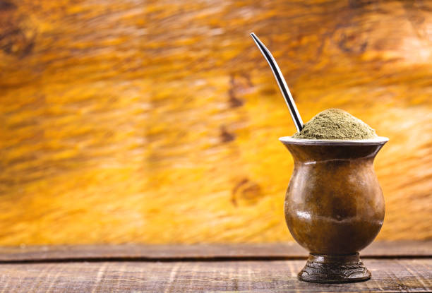 the mate, or chimarrão, is a characteristic drink of southern south american culture. it consists of a gourd, a pump, ground mate and hot water. typical drink from brazil, argentina and uruguay. - infuse imagens e fotografias de stock