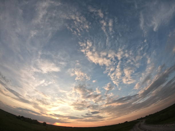 Evening landscape shot with the effect of a fish eye. Dramatic sky.