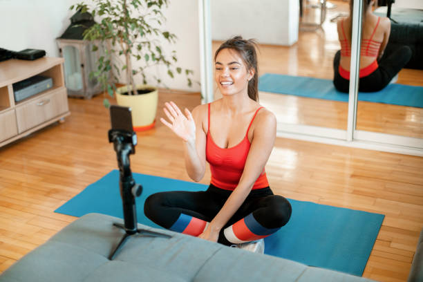 istock Beautiful woman teaching from home using a video chat 1217829863