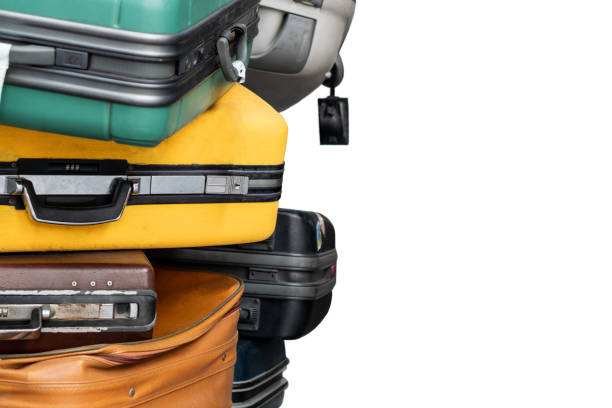 istock Stack of colorful travel suitcases at terminal 1217830847