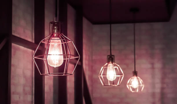 istock Vintage glowing red light bulb lamp 1217830882