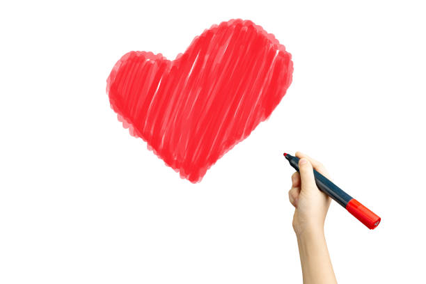 istock marker in hand painted red heart on white 1217832867