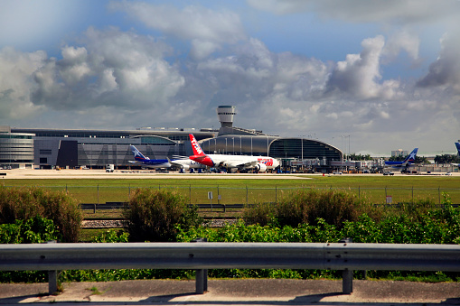 Seattle, USA - Mar 5, 2023: A Delta airlines plane at SeaTac late in the day at a gate.