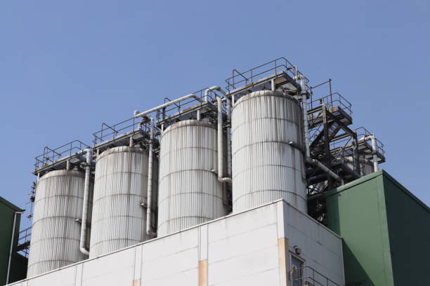 istock Urban industrial architecture including pipes and silos 1217839132