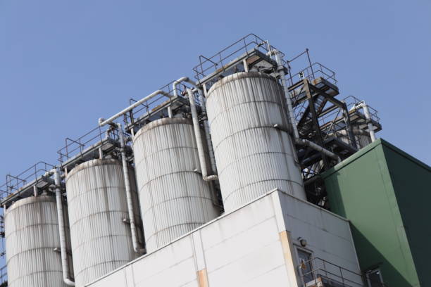 istock Urban industrial architecture including pipes and silos 1217839163